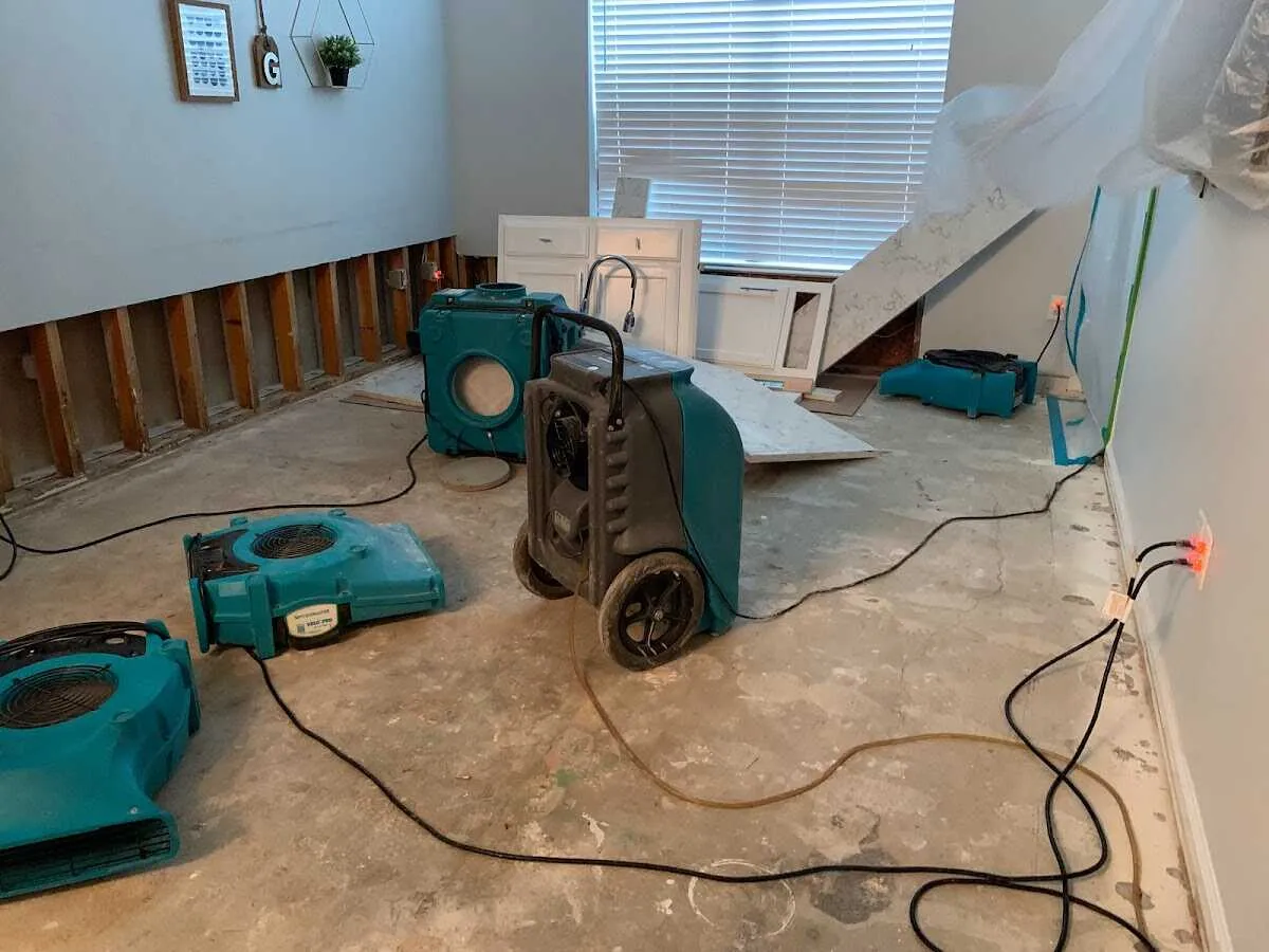 Dehumidifier in flood-cut room for Water Damage Restoration in Palatine